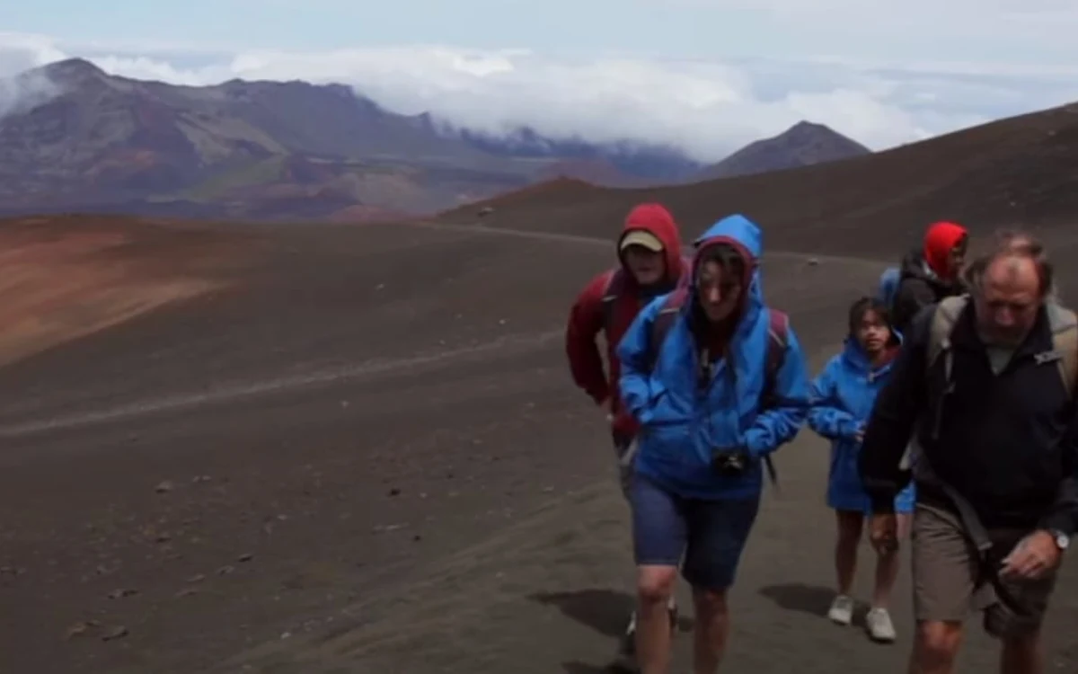Hikers on a trail inside the crater of Haleakalā on Maui